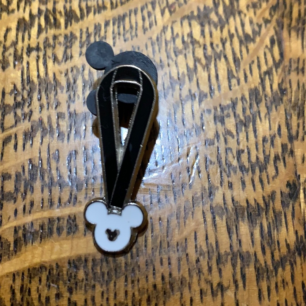 Black ribbon pin